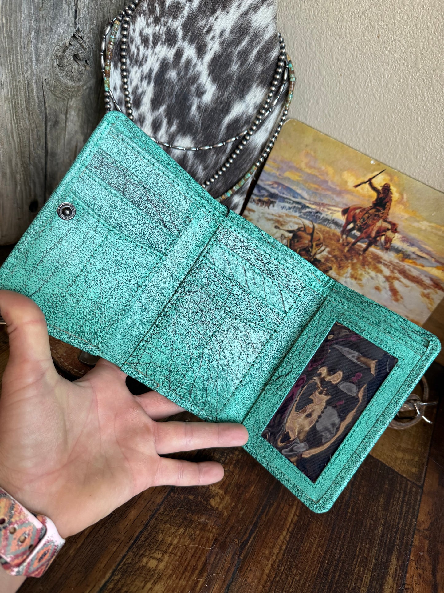 Turquoise tri fold patch wallet