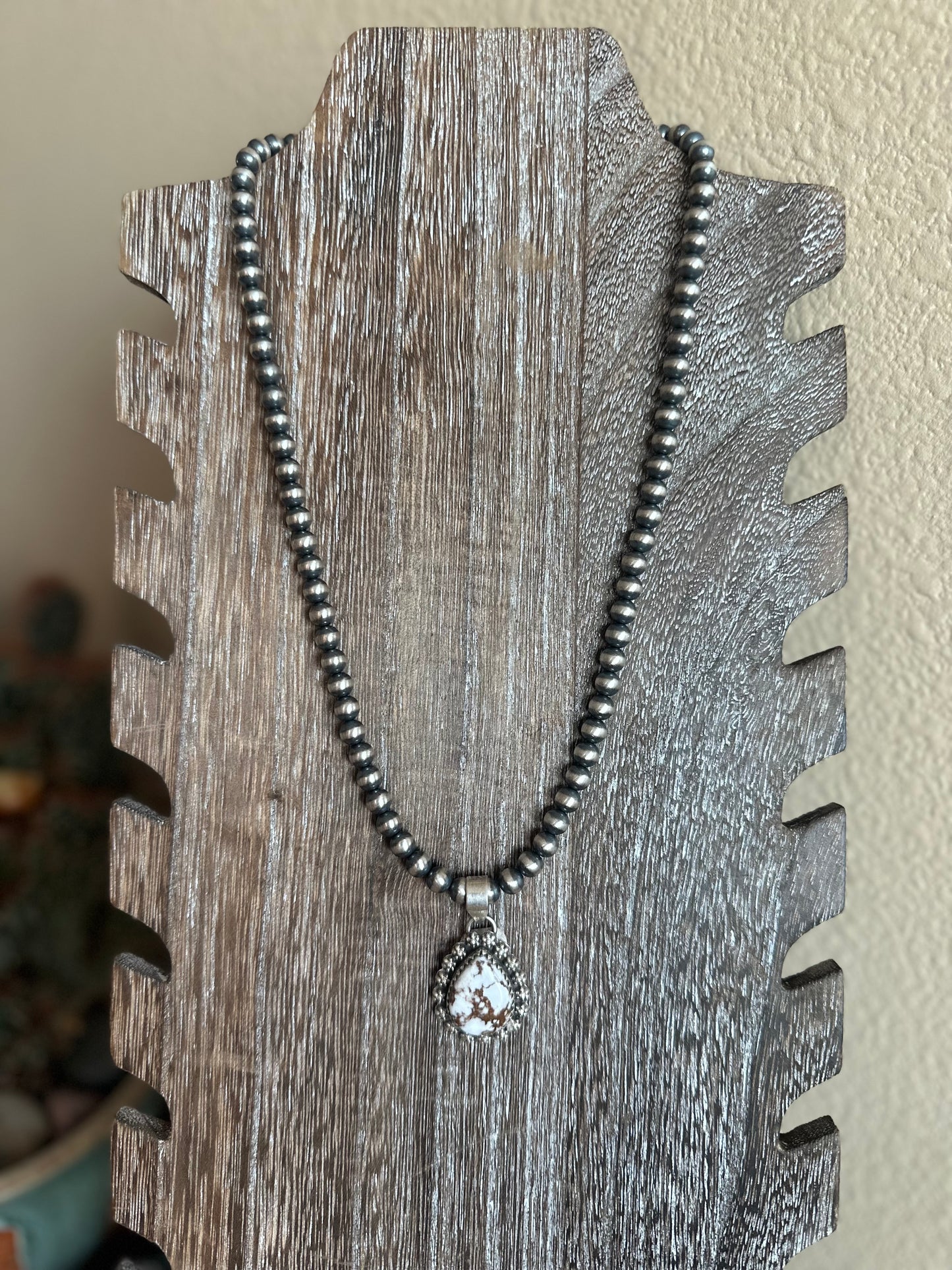 Wild horse pendent (paired with 20 in 6mm pearls)